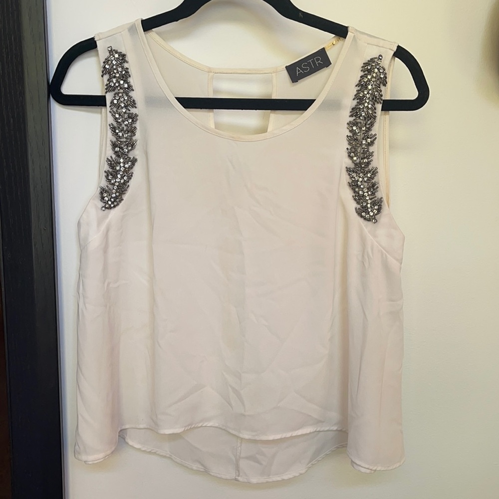 White cropped blouse with beaded shoulder appliqué